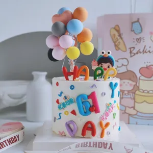 Buntes weiche Tonkuchen-Topper-Set für Kindertag Party Backen Dekoration Details.
