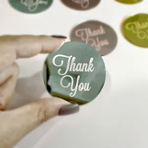 Acrylic Thank You cupcake topper detail, round decorative dessert disk for party celebration.