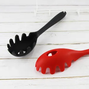 Silicone spaghetti spoon kitchen tool, non-stick pasta server with ergonomic handle for cooking.