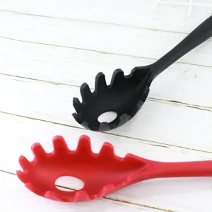 Silicone pasta spoon, ergonomic integrated handle noodle colander for kitchen cooking.