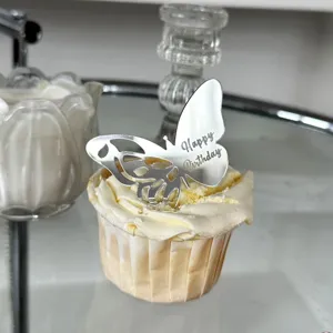 Silver acrylic butterfly cake topper with happy birthday text for party dessert decoration.
