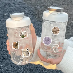 Clear plastic shaker water bottles decorated with aesthetic vintage art collage stickers for daily use.