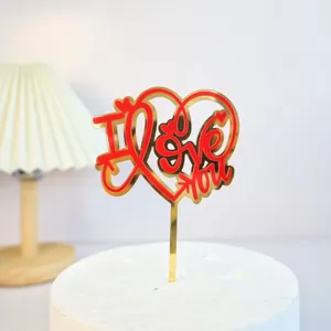 Gold and red acrylic heart cake topper with I love you text, perfect for romantic Valentine's Day party