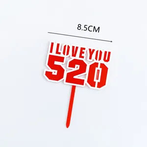 Detail shot of red and white acrylic cake topper with I love you 520 text, 8.5cm width.