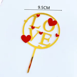 Gold acrylic love cake topper with red hearts, perfect for Valentine's day party decoration.