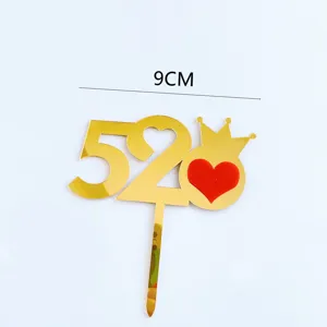 Gold acrylic 520 cake topper detail showing size and romantic heart crown design features.