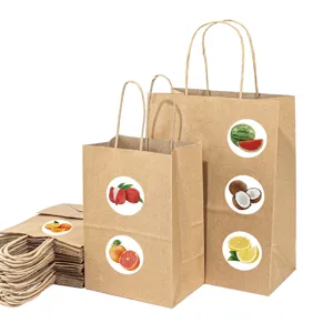 Detail view of eco-friendly brown kraft paper gift bags featuring cute fruit decorative stickers.