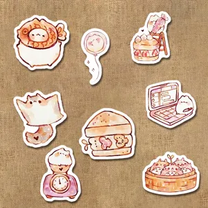 Cute cartoon creature and food doodle stickers detail shot, perfect for journal decoration.