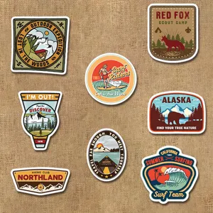 Close-up detail of vintage outdoor hiking and national park themed waterproof matte stickers.