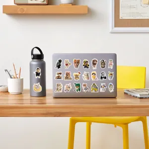 Cute cat meme stickers detail shot, perfect for decorating laptops, water bottles, and stationery items.