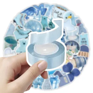 Blauwe esthetische sticker-set en lintverpakking voor dagboek, scrapbooking en knutselen.