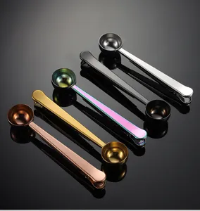 Stainless steel measuring spoons with sealing clip set, dual-ended kitchen baking tools detail view.