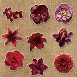 Vue de détail en gros plan d'autocollants décoratifs floraux rouges assortis, parfaits pour les journaux.