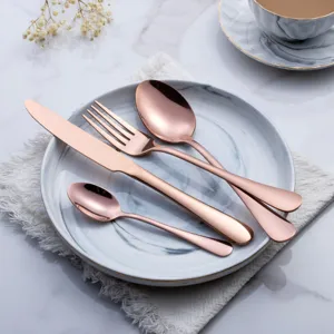 Rose gold stainless steel cutlery set fine detail fork knife spoon tableware display