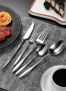 French luxury 304 stainless steel cutlery set, knife, fork, spoon, tableware detail view.
