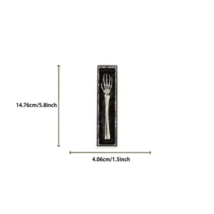 Vintage Halloween skeleton hand bookmark detail view, paper reading marker with clear size specs.