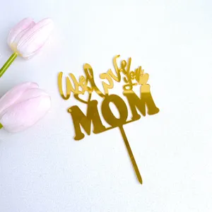 Detailed close-up view of gold mirror acrylic cake topper featuring warm festival text.
