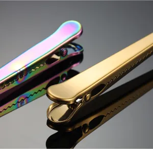 Stainless steel coffee scoop with bag clip detail view, durable kitchen measuring spoon tool