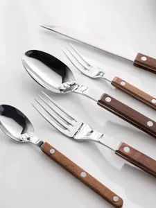 Set de couverts en acier inoxydable avec poignée effet bois, coutellerie vintage française.