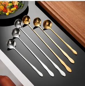 Stainless steel long handle mixing spoon detail view, elegant design for coffee and desserts.