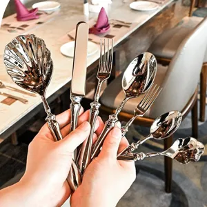 Edelstahl Besteckset mit Kürbisgriff und Muschellöffel für elegante Küche und Tisch