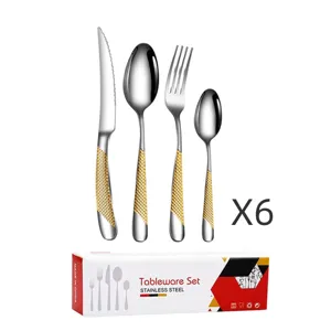 Stainless steel flatware set with golden textured handles and elegant gift box packaging for dining.