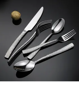 Detailed view of hammer texture stainless steel cutlery set, elegant 5-piece western flatware.