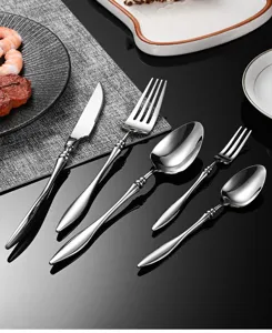 Detailed view of french luxury 304 stainless steel cutlery set, knife, fork and spoon.