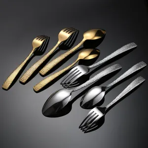 Hammered stainless steel flatware cutlery set, gold and silver dinner fork and spoon.