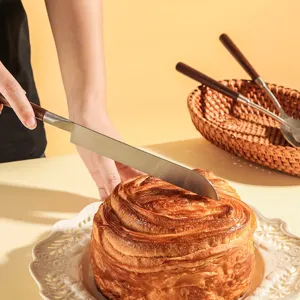 Stainless steel fruit knife with wooden handle, ergonomic kitchen cutter for daily home cooking use.