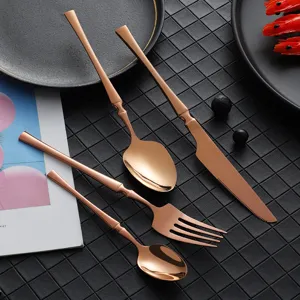 Rose gold stainless steel flatware set, 4-piece luxury cutlery set for modern kitchen dining.