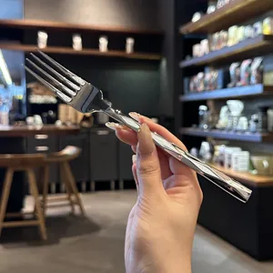 Luxury stainless steel western dining fork with diamond cut handle for hotel and home use.