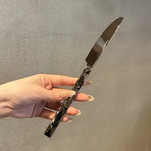 Stainless steel steak knife with diamond cut handle, mirror polished dinner tableware.