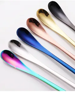 Detailed view of long handle stainless steel mixing spoons in vibrant multi-colors.