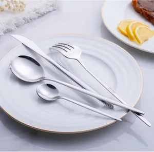 Stainless steel flatware detail view, knife fork and spoon set close-up display.