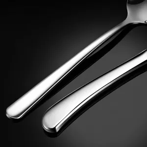 Stainless steel dinner spoon with extended handle, premium heavy metallic finish for dining table.