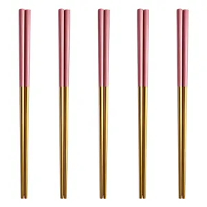 Modern stainless steel chopsticks set, pink and gold metal square tableware for home kitchen use.