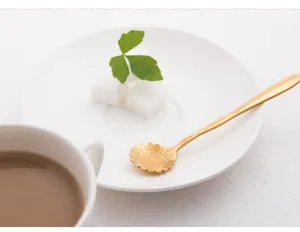 Golden sunflower coffee spoon detail scene, elegant stainless steel dessert spoon for tea honey.