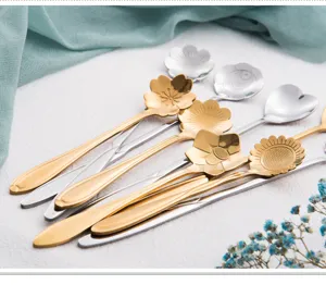 Stainless steel flower coffee spoon set featuring gold and silver floral designs for dessert.