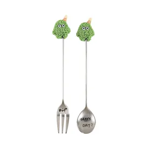Cute stainless steel spoon and fork set with fuzzy cartoon monster charms for daily use.