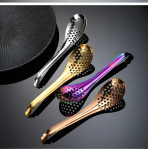 Stainless steel caviar slotted spoon for molecular gastronomy kitchen use and cooking.