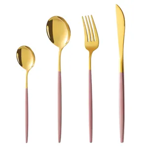 Gold stainless steel flatware set with pink handles, knife, fork and spoons for kitchen