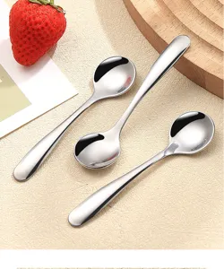 Stainless steel mini spoon detail, perfect for tasting, yogurt and ice cream enjoyment.