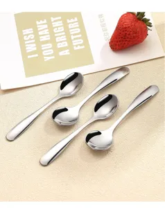 Stainless steel mini spoons detail view, polished surface, perfect for yogurt and desserts.