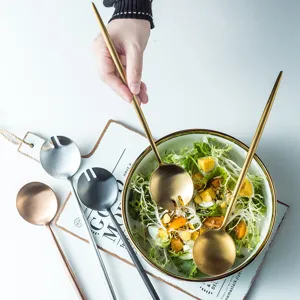 Portuguese style stainless steel salad serving spoon and fork set with long handle for table.