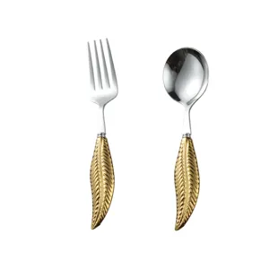 Stainless steel fork and spoon set with luxurious gold leaf handle for elegant dining