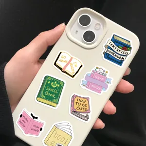 Close-up of aesthetic bookish stickers on phone case, cute journal decorative decals.