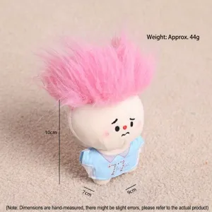 Cute crying plush doll pendant with pink spiky hair and blue shirt key chain accessory.