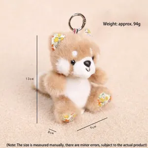 Cute plush animal keychain pendant with floral ears and metal ring, soft toy decoration.