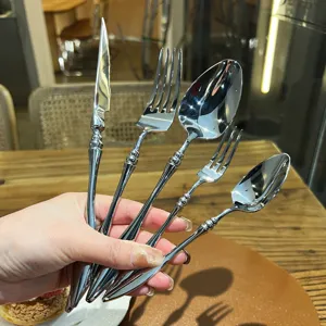 Stainless steel western cutlery set, french vintage style knife, fork and spoon for table.